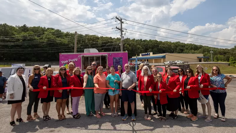 Pink Puppy Sno celebrates Ribbon Cutting.